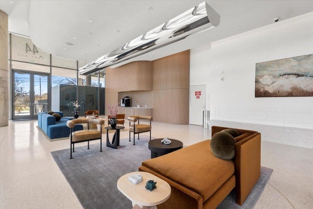 44 E Ave Unit 2509, Austin, TX 78701 - lobby featuring a high ceiling and a surveillance system