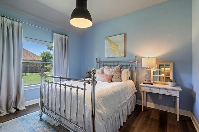 577 Shelf Rock Rd, Driftwood, TX 78619 - bedroom featuring wood finished floors and vaulted ceiling