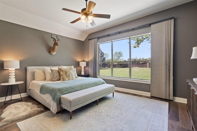 577 Shelf Rock Rd, Driftwood, TX 78619 - bedroom featuring baseboards, wood finished floors, a ceiling fan, and vaulted ceiling