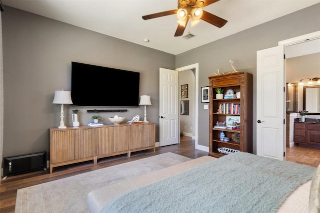 577 Shelf Rock Rd, Driftwood, TX 78619 - bedroom with wood finished floors and ensuite bathroom