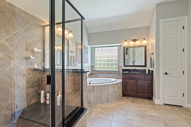 577 Shelf Rock Rd, Driftwood, TX 78619 - full bath featuring a garden tub, vanity, a shower stall, and marble finish flooring
