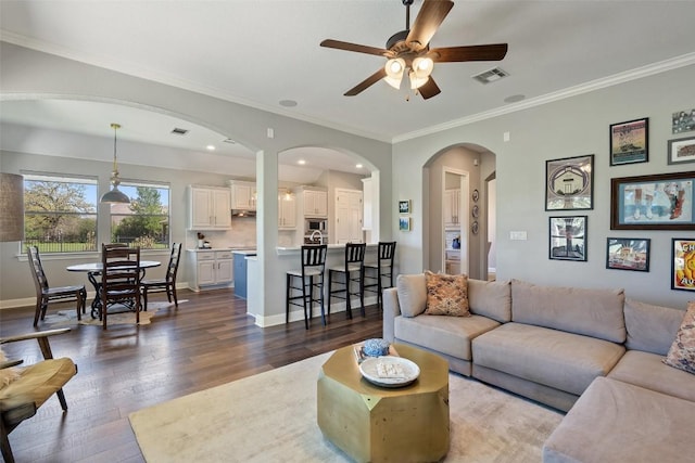 577 Shelf Rock Rd, Driftwood, TX 78619 - living area with dark wood-type flooring, a ceiling fan, crown molding, baseboards, and recessed lighting