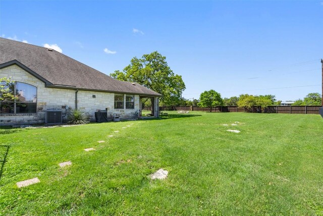 577 Shelf Rock Rd, Driftwood, TX 78619 - view of yard featuring central AC