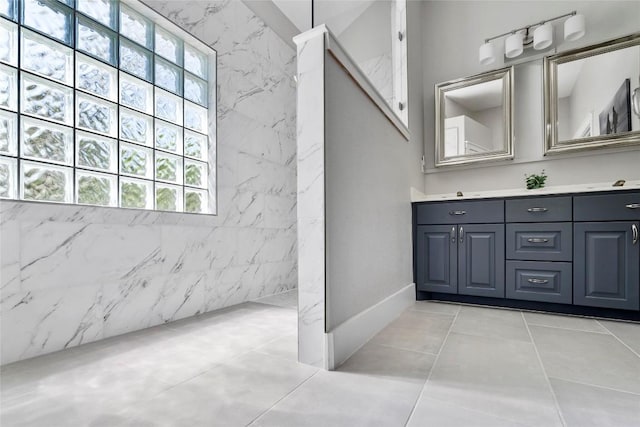 119 Maple Leaf Trl, Elgin, TX 78621 - bathroom with double vanity, a marble finish shower, and tile patterned flooring
