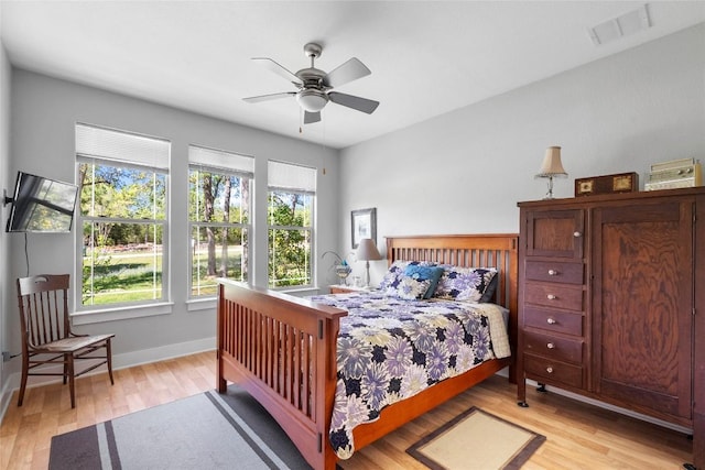 119 Maple Leaf Trl, Elgin, TX 78621 - bedroom featuring light wood-style flooring and ceiling fan