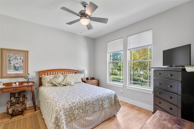 119 Maple Leaf Trl, Elgin, TX 78621 - bedroom with light wood finished floors and ceiling fan