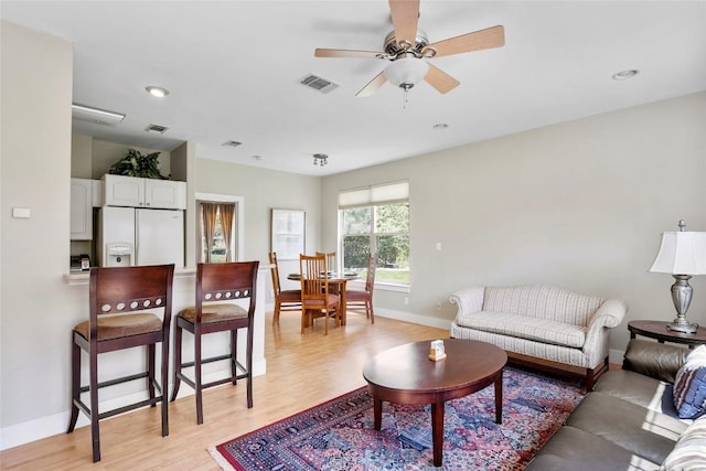 119 Maple Leaf Trl, Elgin, TX 78621 - living area featuring a ceiling fan, light wood-style floors, and recessed lighting