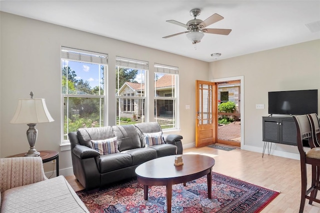 119 Maple Leaf Trl, Elgin, TX 78621 - living room featuring wood finished floors and ceiling fan
