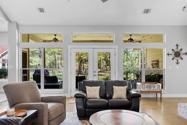 119 Maple Leaf Trl, Elgin, TX 78621 - living area with a ceiling fan, french doors, and healthy amount of natural light