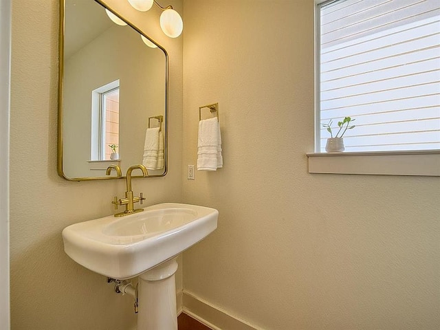 bathroom featuring baseboards