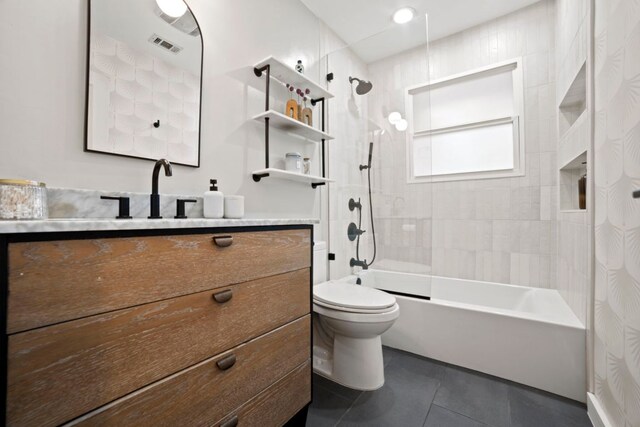 6009 Grover Ave, Austin, TX 78757 - full bathroom featuring vanity, tile patterned flooring, shower / tub combo with curtain, and toilet