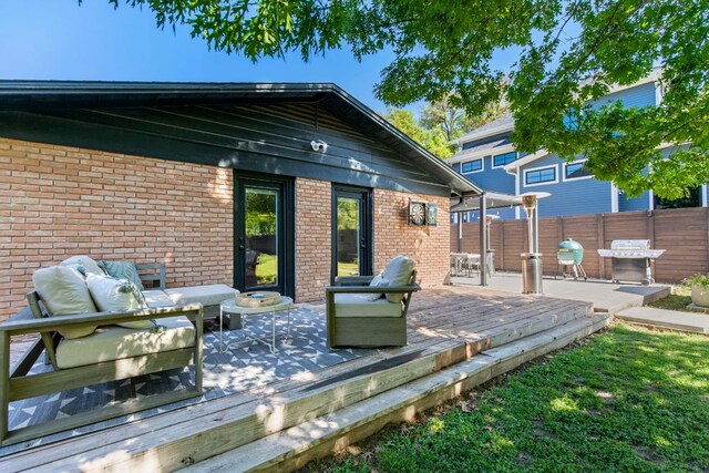 6009 Grover Ave, Austin, TX 78757 - wooden terrace featuring an outdoor living space