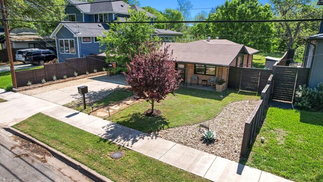 6009 Grover Ave, Austin, TX 78757 - view of front of property with covered porch and a residential view