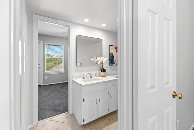 6013 Mountain Villa Dr, Austin, TX 78731 - bathroom featuring vanity, tile patterned flooring, baseboards, and recessed lighting