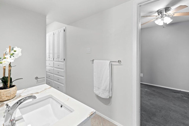 6013 Mountain Villa Dr, Austin, TX 78731 - bathroom with ceiling fan, baseboards, and vanity