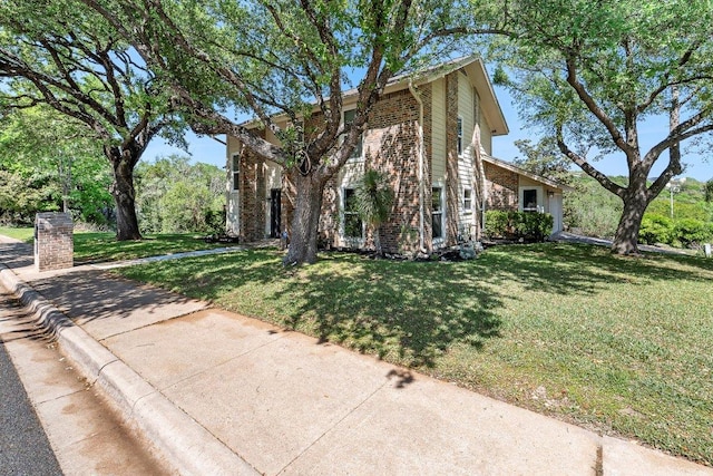 6013 Mountain Villa Dr, Austin, TX 78731 - view of front of house with brick siding and a front yard
