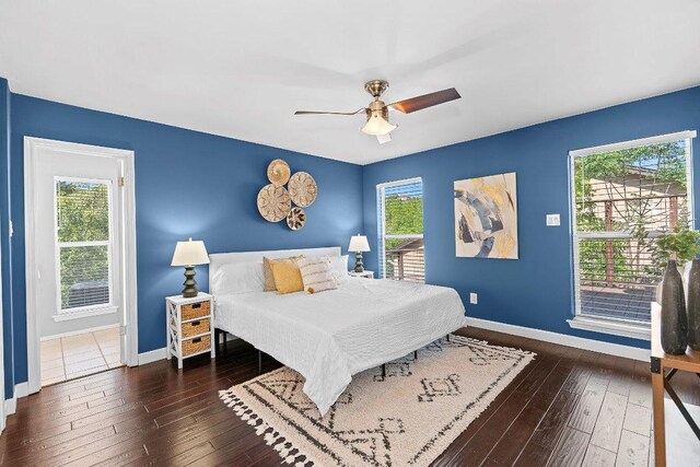 6013 Mountain Villa Dr, Austin, TX 78731 - bedroom featuring hardwood / wood-style floors, baseboards, and a ceiling fan