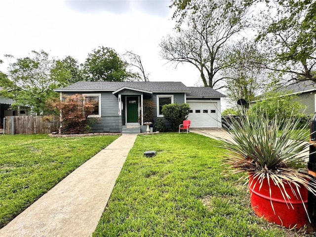 716 Barbara Dr, San Marcos, TX 78666 - view of front facade with a front yard, an attached garage, fence, and driveway