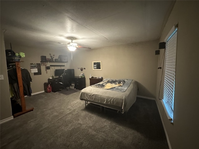 409 E Houston St, Mexia, TX 76667 - carpeted bedroom featuring an office area, a ceiling fan, and baseboards