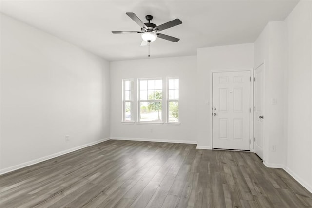 124 Rollingwood Dr, San Marcos, TX 78666 - entryway with baseboards, dark wood-style flooring, and ceiling fan