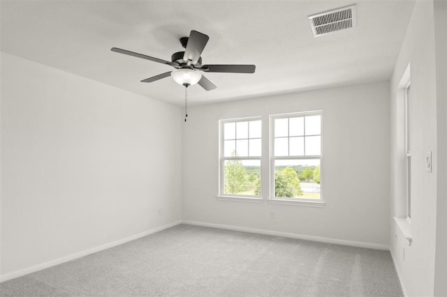 124 Rollingwood Dr, San Marcos, TX 78666 - unfurnished room featuring baseboards, light colored carpet, and a ceiling fan