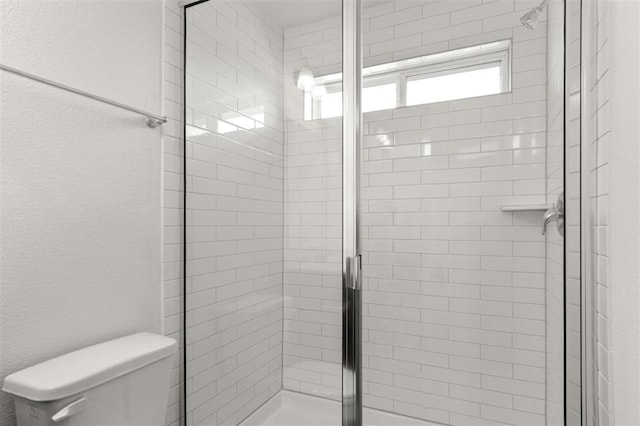 124 Rollingwood Dr, San Marcos, TX 78666 - bathroom featuring a shower stall and toilet