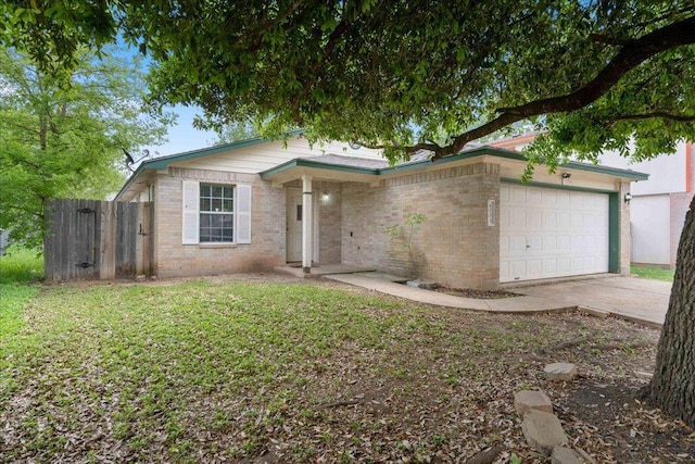 4003 Reeders Dr, Austin, TX 78725 - single story home featuring an attached garage, driveway, and brick siding