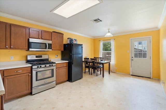 4003 Reeders Dr, Austin, TX 78725 - kitchen with appliances with stainless steel finishes, ornamental molding, light countertops, brown cabinets, and light flooring