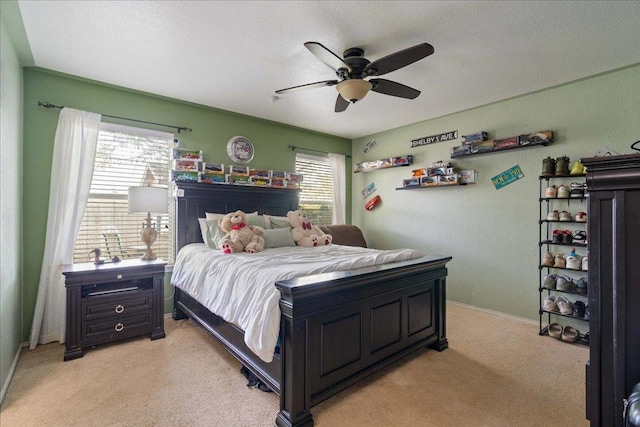 4003 Reeders Dr, Austin, TX 78725 - bedroom featuring light colored carpet, ceiling fan, and a textured ceiling