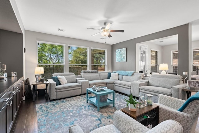 104 Atlanta Park Dr, Georgetown, TX 78628 - living room featuring ceiling fan, dark wood finished floors, and healthy amount of natural light
