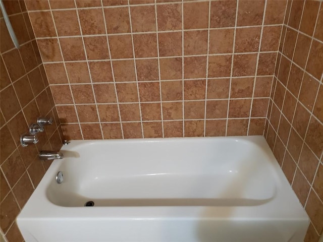 full bath with a bath