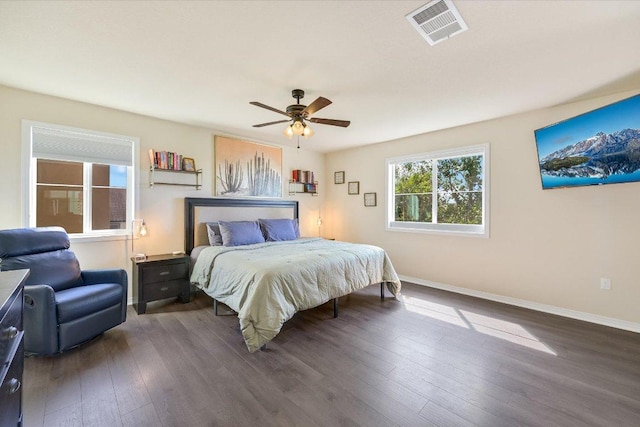 11208 Mickelson Dr, Austin, TX 78747 - bedroom with dark wood-style flooring and a ceiling fan
