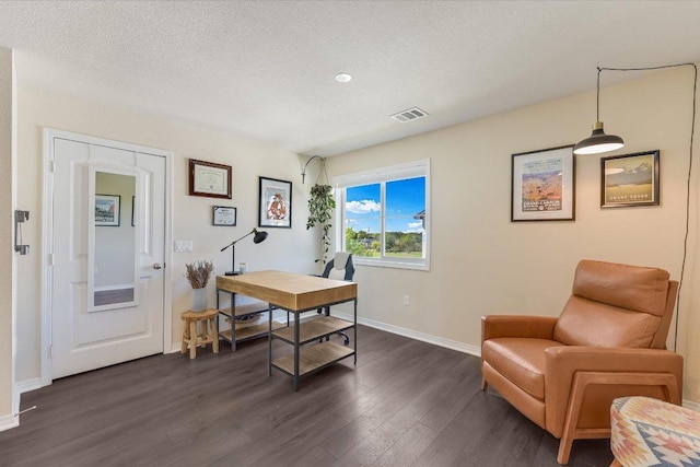 11208 Mickelson Dr, Austin, TX 78747 - office space featuring dark wood-type flooring and a textured ceiling