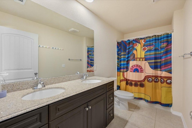 11208 Mickelson Dr, Austin, TX 78747 - bathroom featuring double vanity, tile patterned flooring, and a shower with shower curtain
