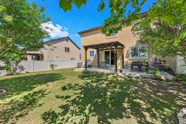 11208 Mickelson Dr, Austin, TX 78747 - back of house featuring a pergola, a patio area, and stucco siding