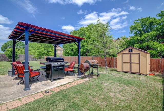 view of yard with an outbuilding, a fenced backyard, a pergola, a shed, and a patio