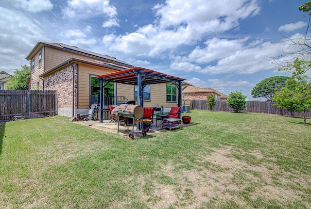 view of yard featuring a patio area and a fenced backyard