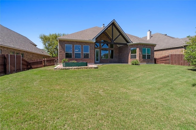 118 Bluehaw Dr, Georgetown, TX 78628 - rear view of house featuring brick siding and a shingled roof