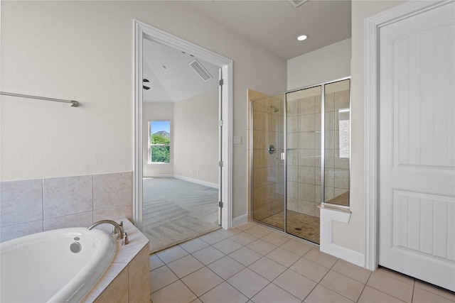 118 Bluehaw Dr, Georgetown, TX 78628 - bathroom with a bath, tiled shower, baseboards, tile patterned floors, and recessed lighting