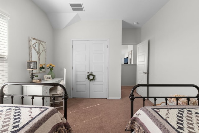 bedroom with visible vents, baseboards, and carpet flooring