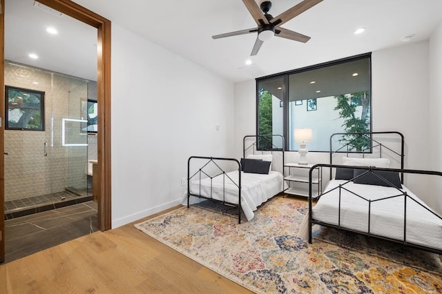 3500 Cactus Wren Way, Austin, TX 78746 - bedroom with wood finished floors and recessed lighting
