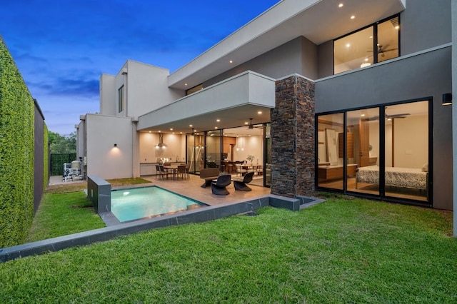 3500 Cactus Wren Way, Austin, TX 78746 - rear view of house featuring a balcony, stucco siding, and a patio