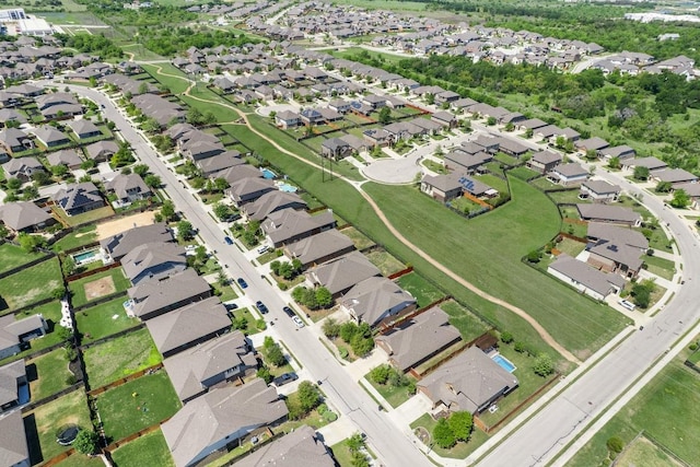 aerial view of property's location featuring nearby suburban area