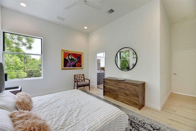 2312 Enfield Rd Unit 2, Austin, TX 78703 - bedroom with light wood-style floors, recessed lighting, ceiling fan, and ensuite bathroom