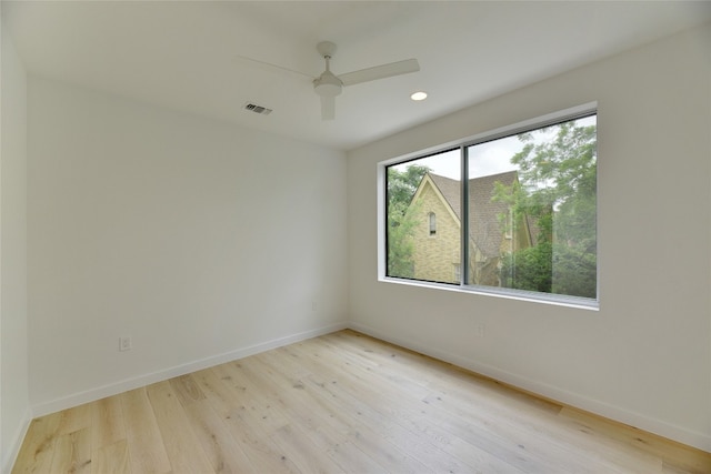 2312 Enfield Rd Unit 2, Austin, TX 78703 - empty room with light wood finished floors, baseboards, a ceiling fan, and recessed lighting