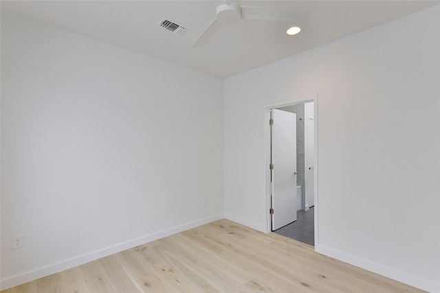 2312 Enfield Rd Unit 2, Austin, TX 78703 - spare room with wood finished floors, recessed lighting, and baseboards