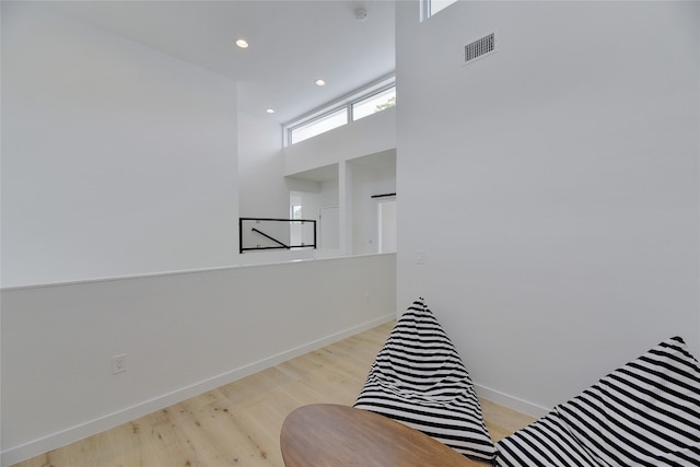 2312 Enfield Rd Unit 2, Austin, TX 78703 - interior space featuring wood finished floors, a high ceiling, baseboards, and recessed lighting