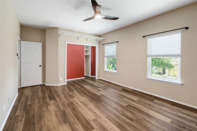 2204 Rick Whinery Dr, Austin, TX 78728 - unfurnished bedroom with wood finished floors, a closet, baseboards, and ceiling fan