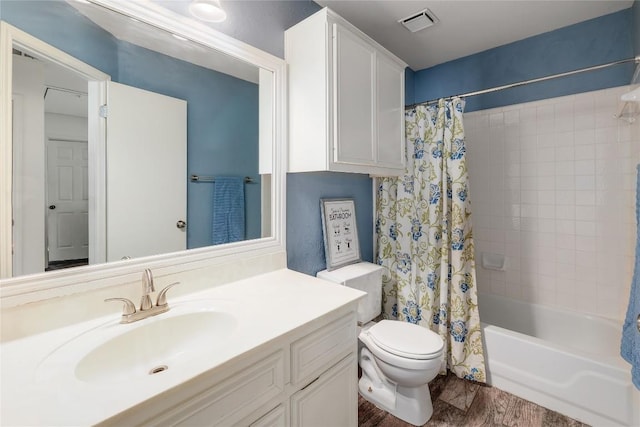 2204 Rick Whinery Dr, Austin, TX 78728 - full bathroom with vanity, shower / bathtub combination with curtain, and wood finished floors