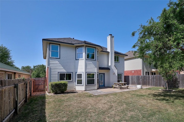 2204 Rick Whinery Dr, Austin, TX 78728 - rear view of property with a patio area and a chimney